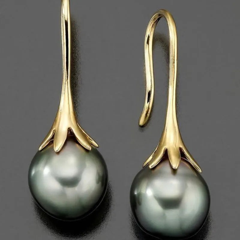 Gold electroplated retro fashion women's earrings with alloy construction
