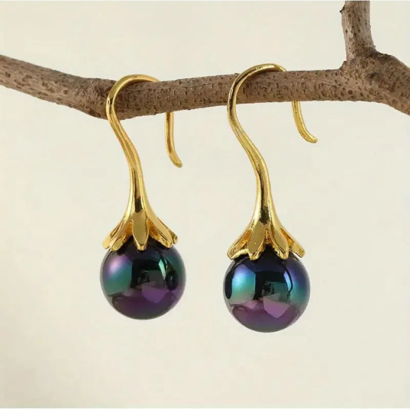 Gold electroplated retro fashion women's earrings with alloy construction