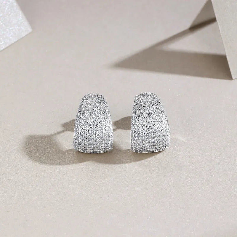 Geometric S925 sterling silver ear studs with colourless moissanite stones in a gift box.