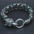 Handmade titanium steel wolf head bracelet with camouflage colour finish showing polished surface detail