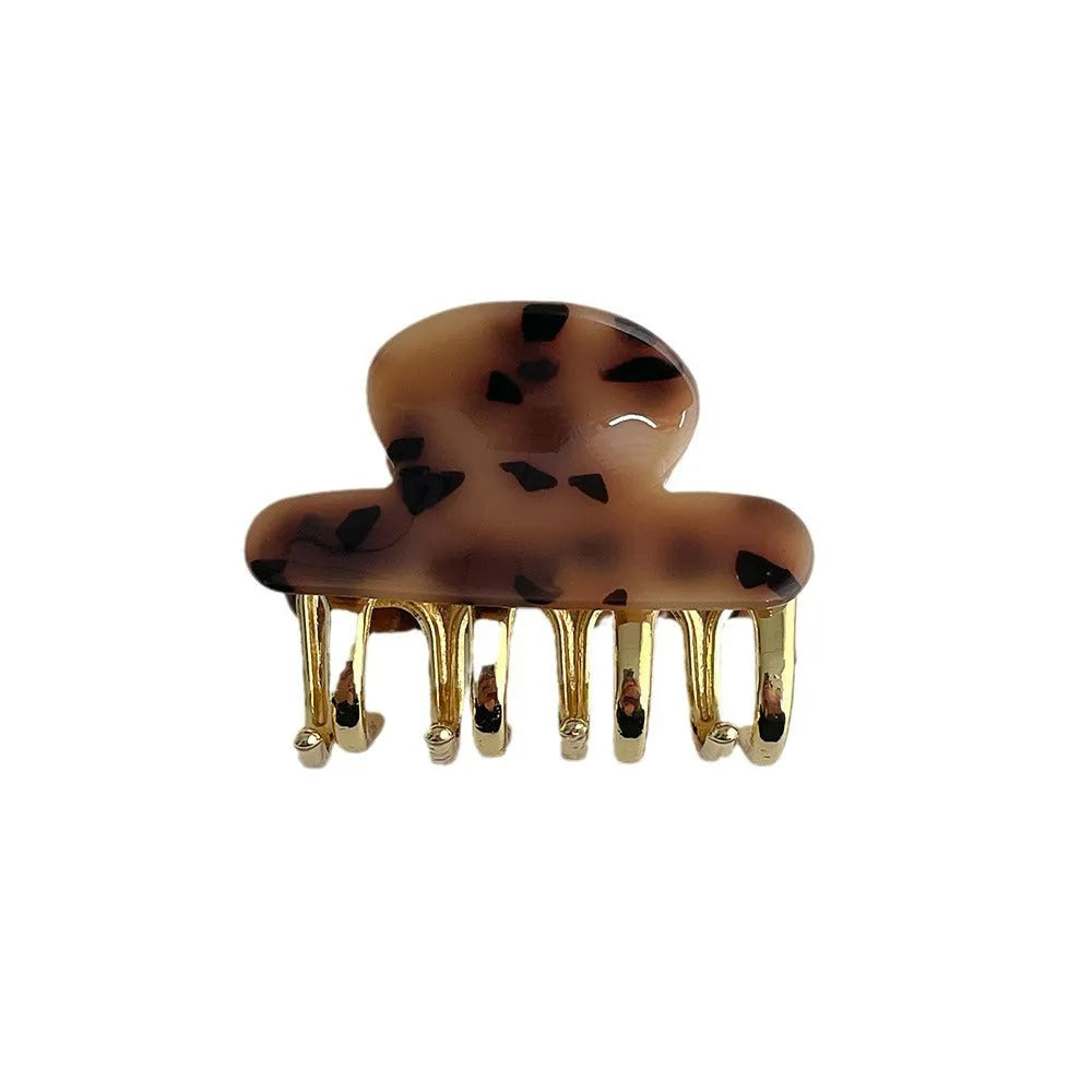 Retro acetate hair barrettes with metal grip in four colour variations including leopard print