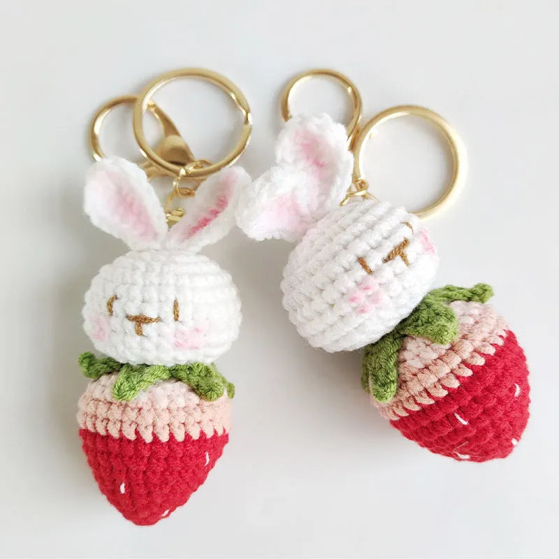 Hand-woven rabbit pendant with strawberry pattern made from four-strand wire with key attachment