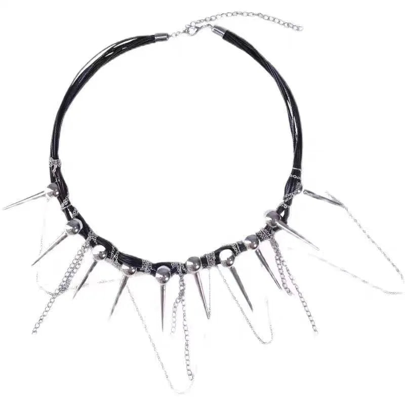 Leather necklace with electroplated rivets, round beads, and a tassel in a winding casual design