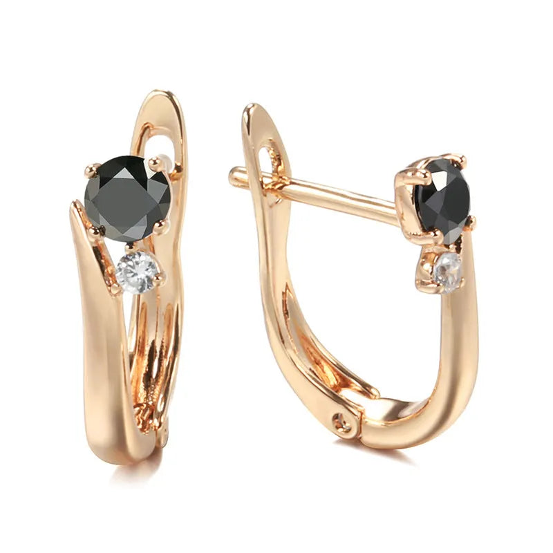 Gold colour geometric drop earrings with a black agate stone inlay for women.