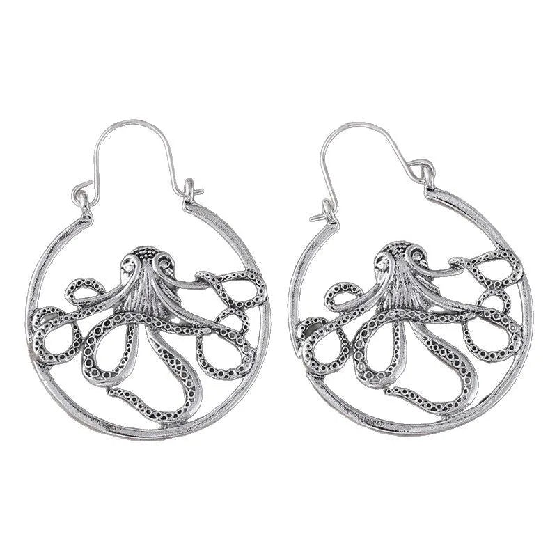 Vintage antique silver octopus earrings with detailed tentacles, retro animal zodiac design.