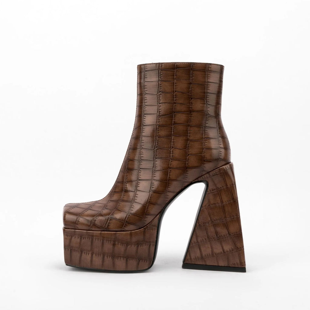 Women's brown ankle boot with a high heel above 8cm and an artificial PU upper