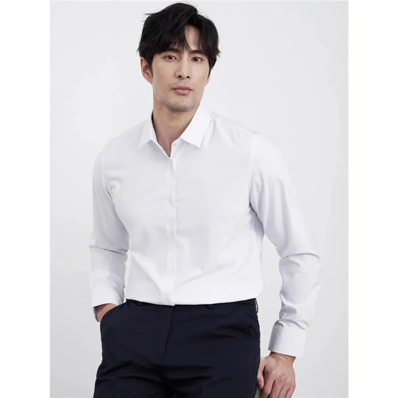Man wearing a wine red slim fit long sleeve business casual shirt.