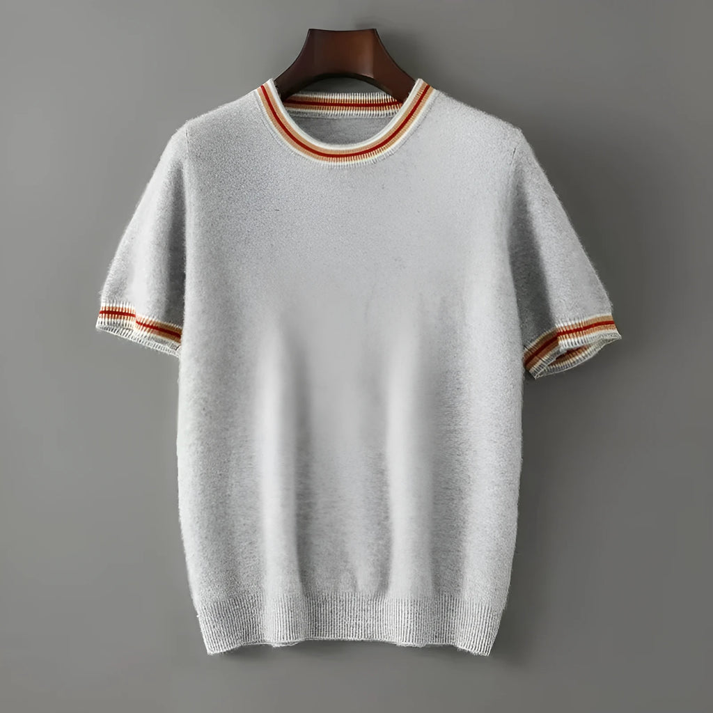 Men's grey short sleeve wool sweater with a round neck, laid flat