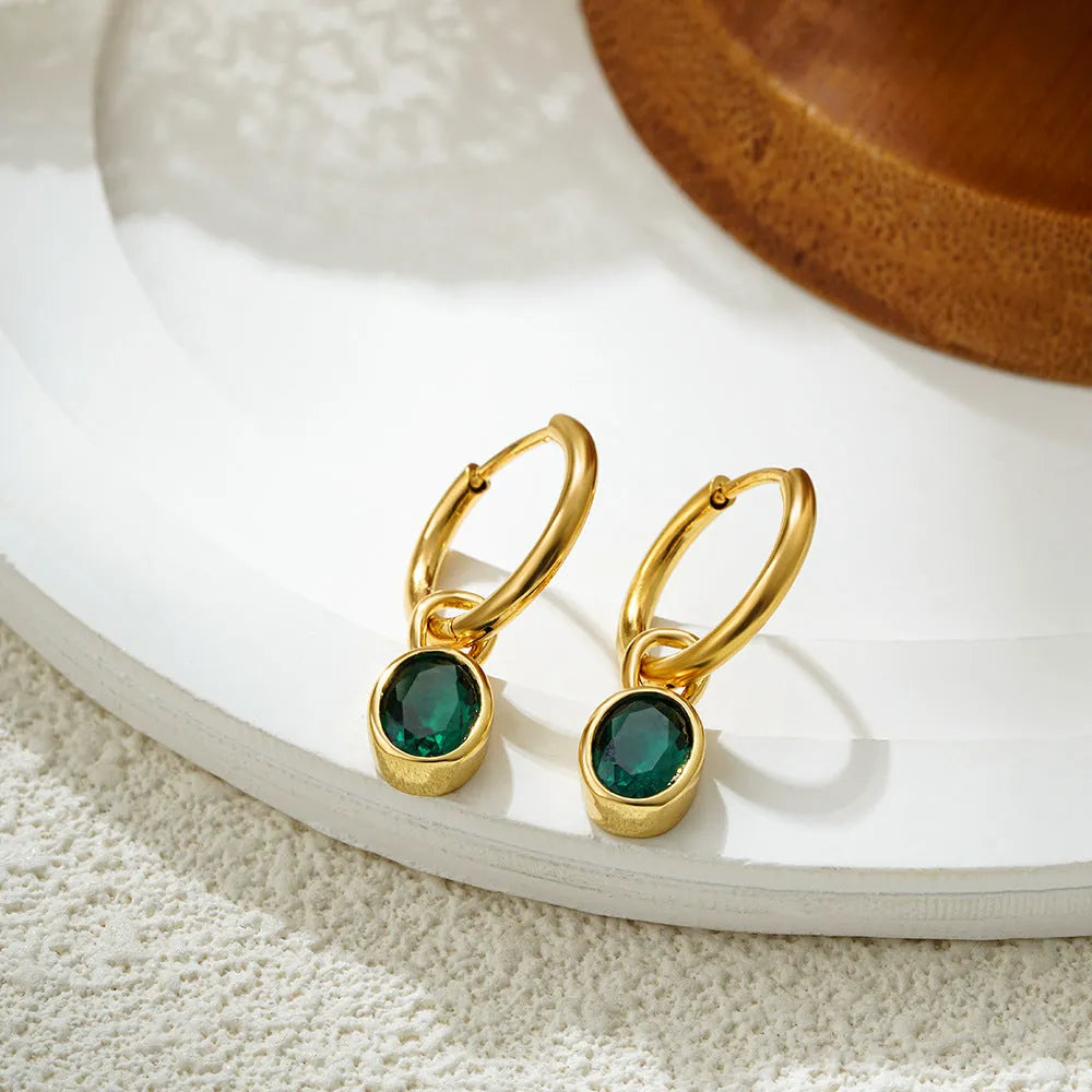 Women's retro-style oval zircon earrings in copper, shown in six colour options on a white background.