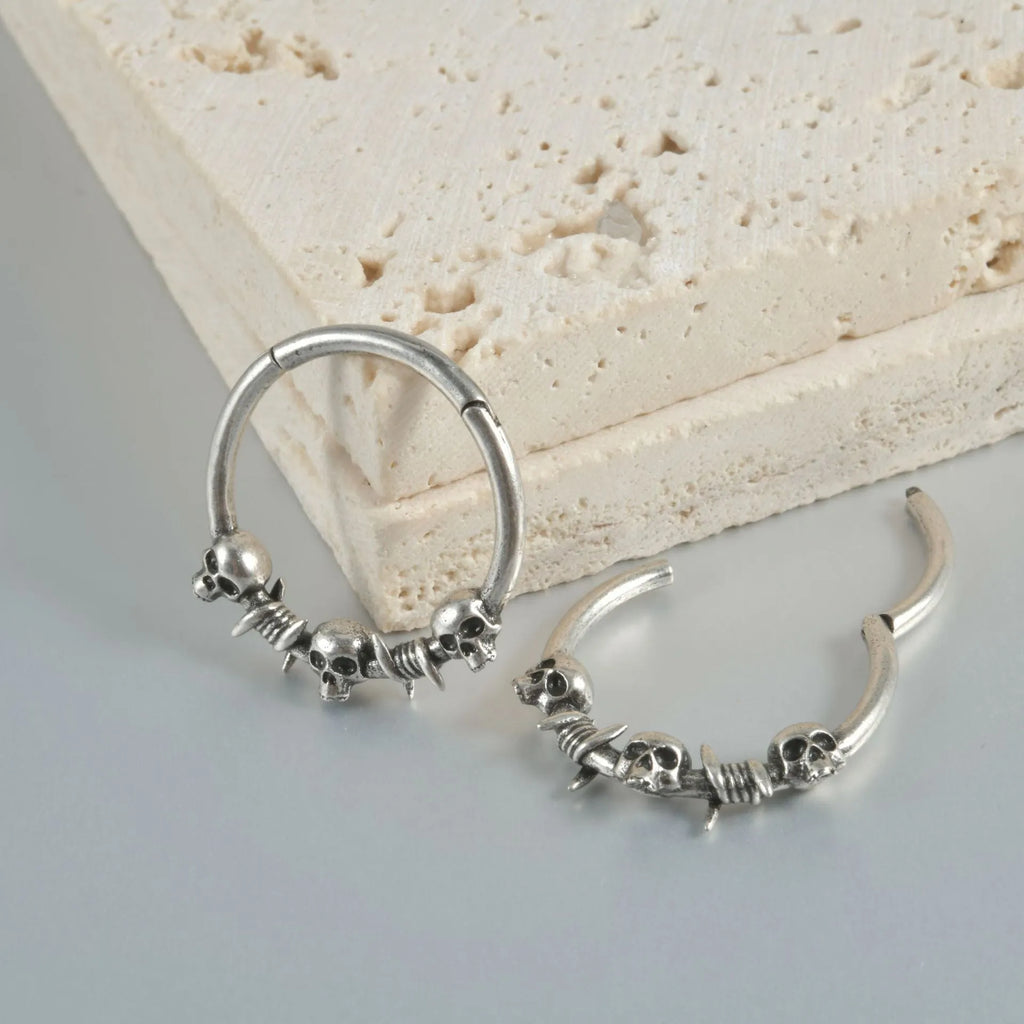 Copper punk earrings with ghost head design in antique silver and gold finishes