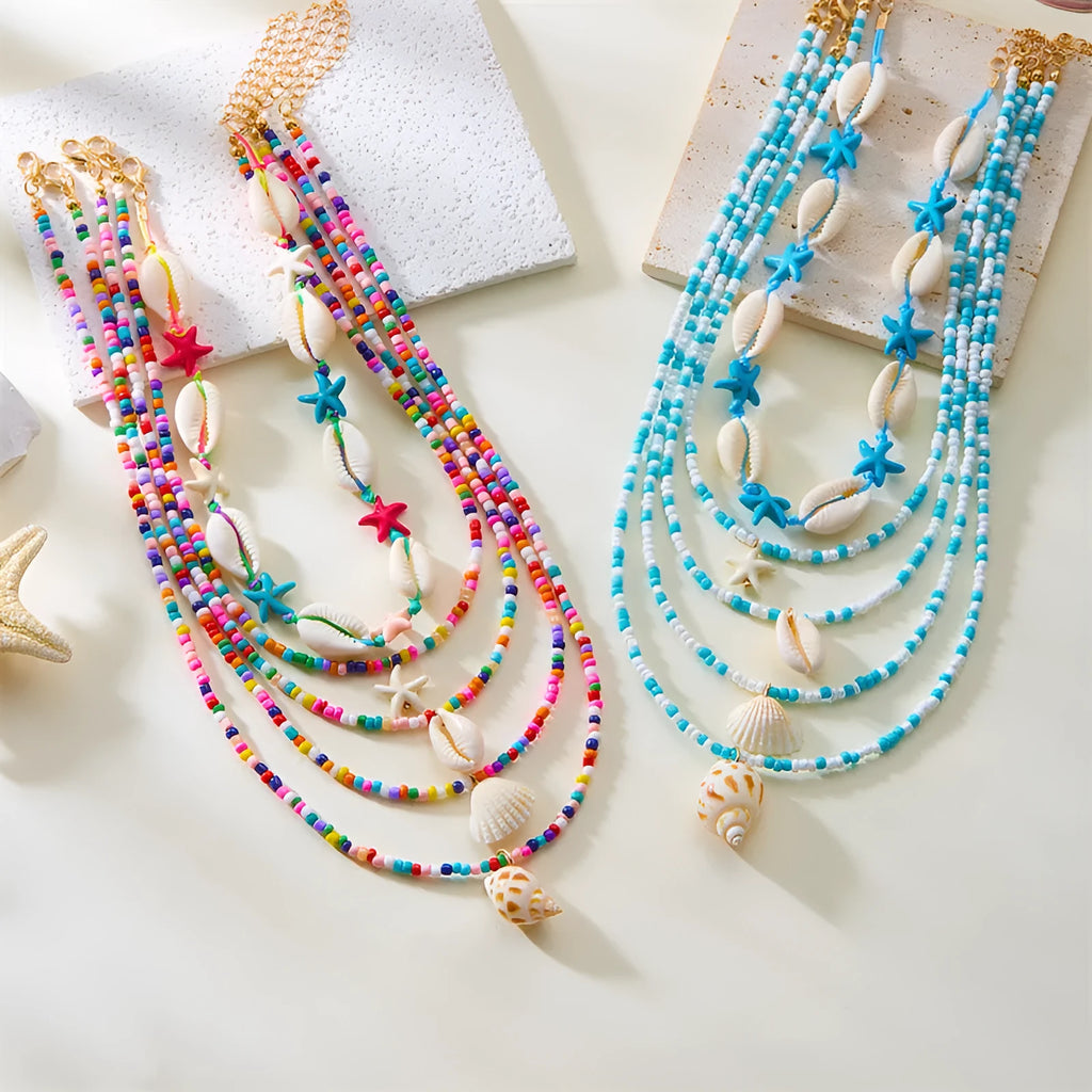 Blue shell and starfish pendant necklace set with five pieces on 21-50cm chains