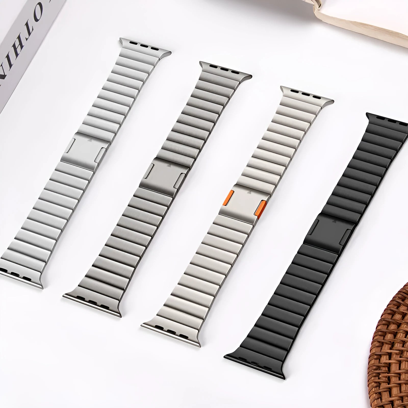 Stainless steel magnetic buckle Apple Watch replacement band in silver colour on a wrist.