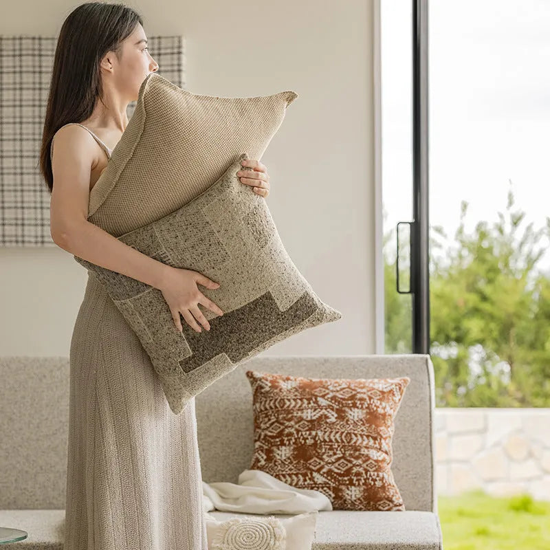Coreless red brown and solid colour sofa cushion with PP cotton filler on a living room sofa.