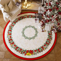 Round red and green Christmas themed non-slip polyester floor mat on a living room floor.