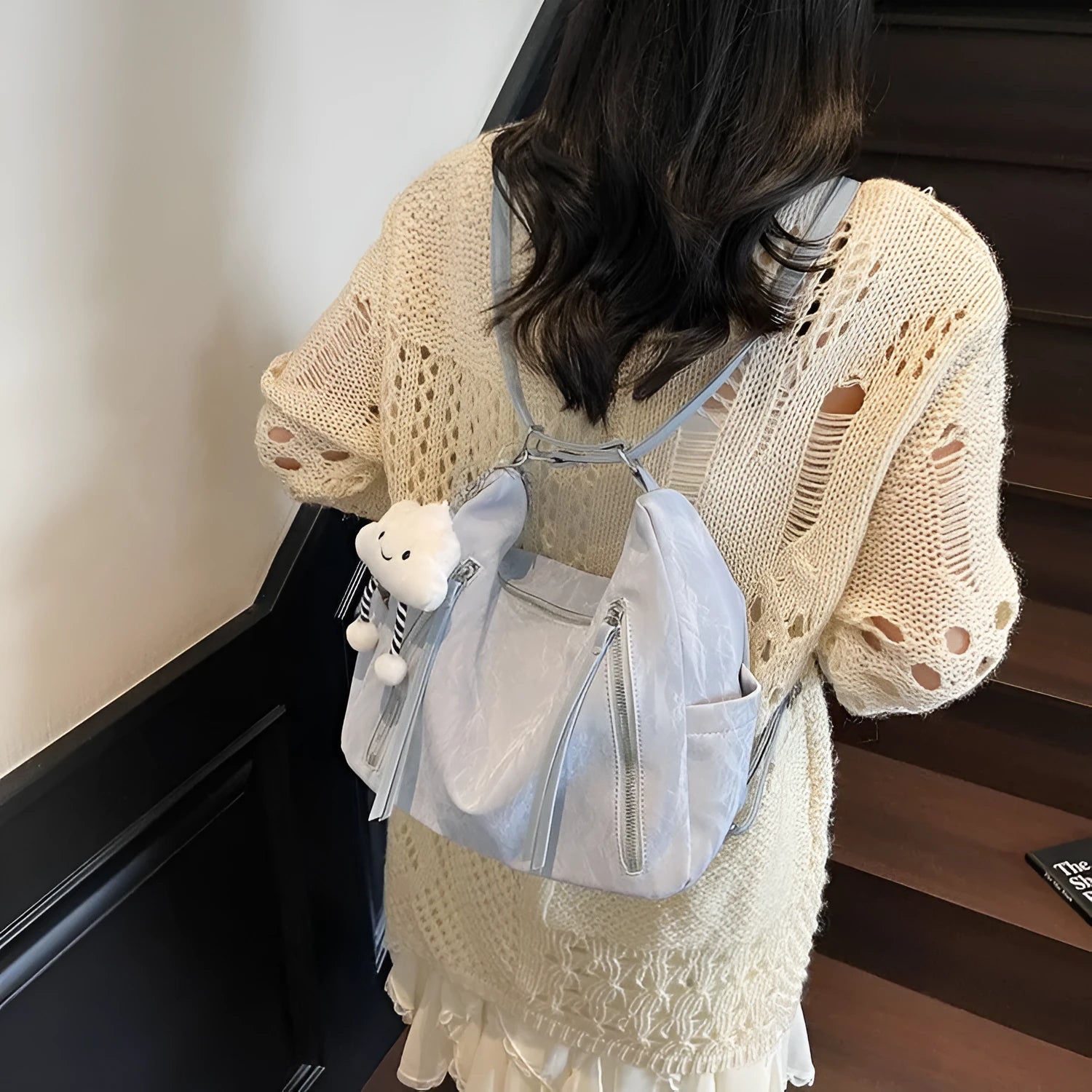 Women's soft PU fashion backpack with pendant accessory in black, milky white, silver or blue colour