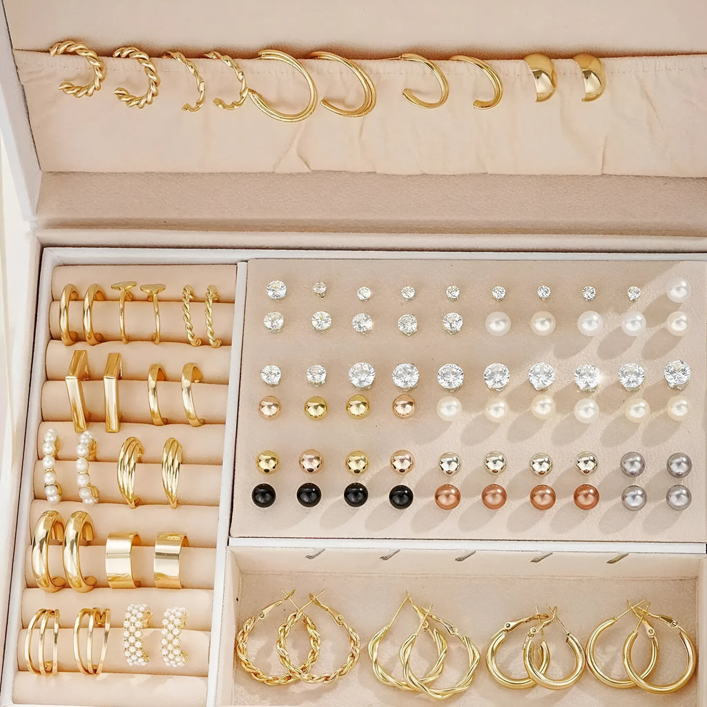 108 geometric pearl earrings in gold and yellow colours with round elements on alloy studs