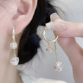 Silver confession balloon earrings with double pendant design and rhinestone ball decoration