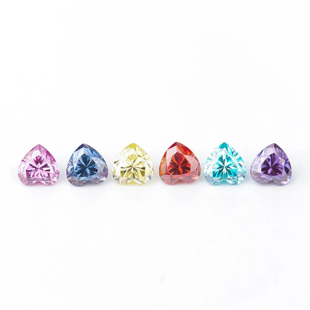Colourful heart-shaped moissanite stone in lemon yellow, red, pink, blue and purple colours