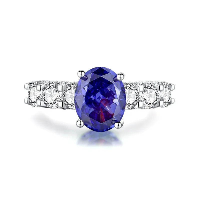 Heart-shaped high carbon diamond-cut ice flower zircon stone in a women's 925 sterling silver ring.