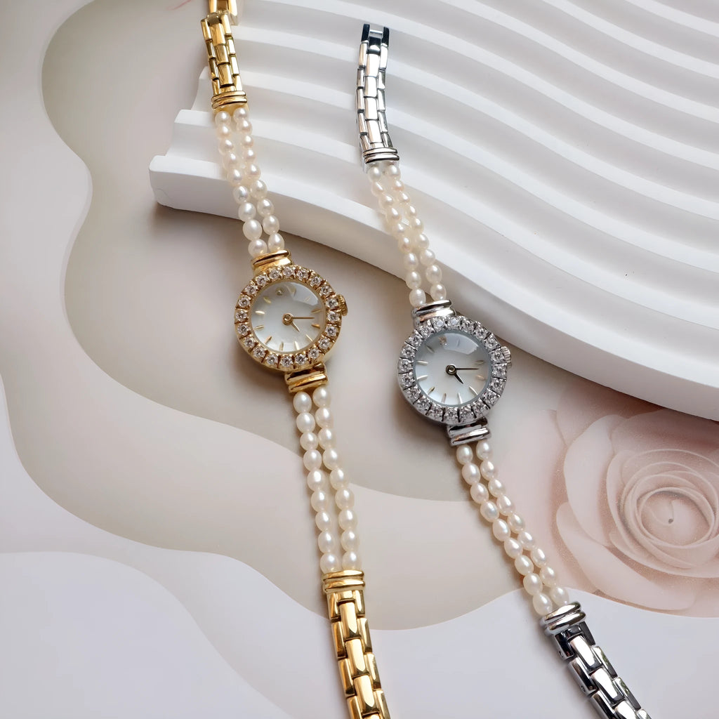 Women's light gold bracelet watch with freshwater pearls, 18mm round dial, single folding buckle