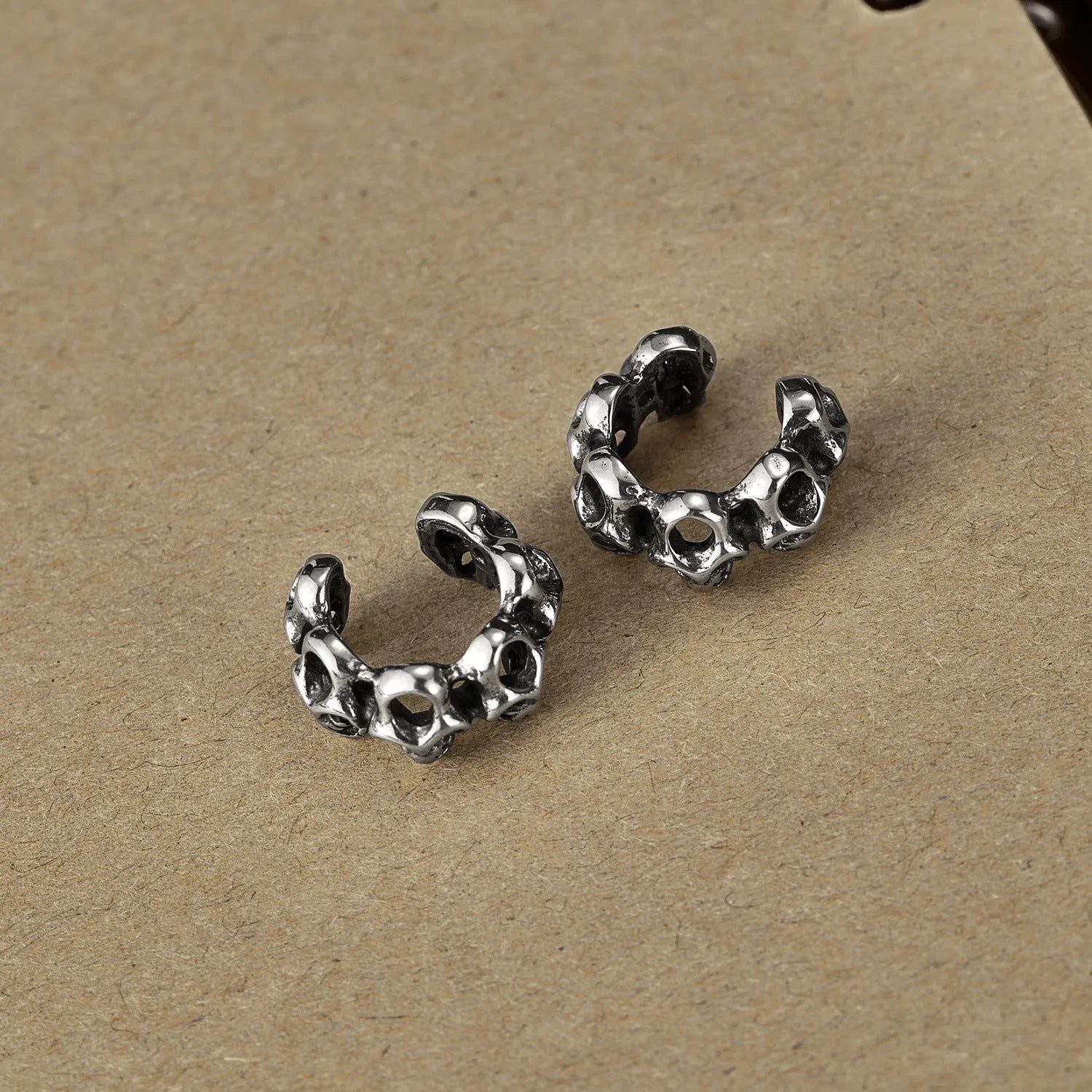 Stainless steel hollow skull ear clip earrings with geometric shape and retro hip hop style