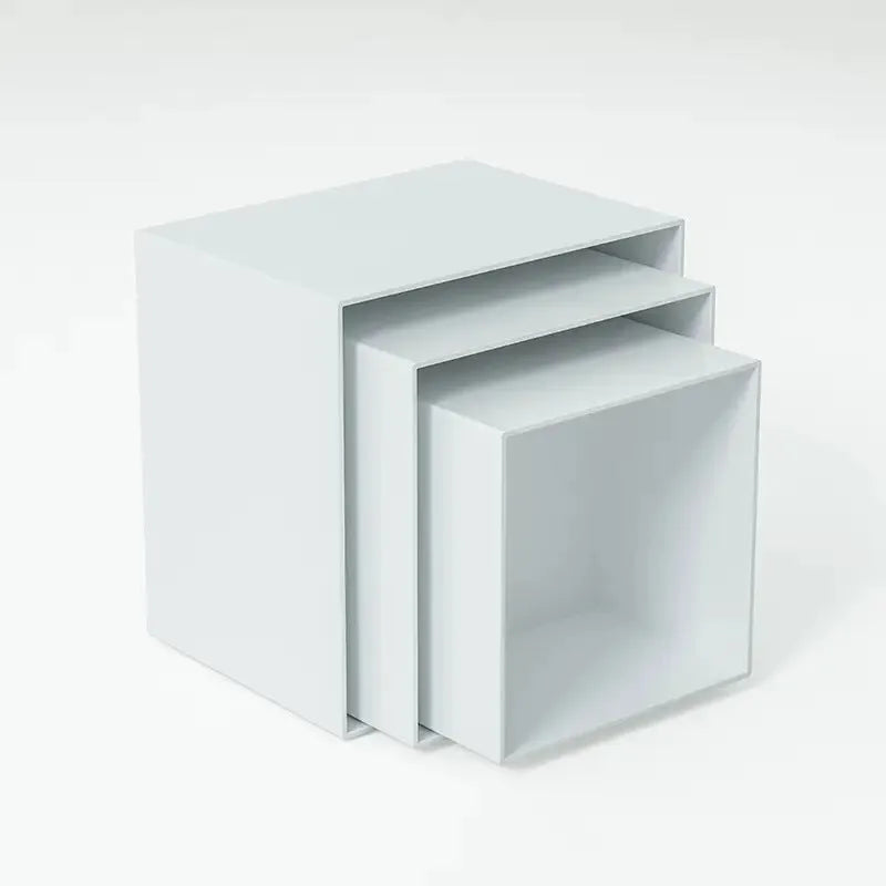 White plastic suit cube dessert display stand with six-piece arrangement for tabletop cake presentation