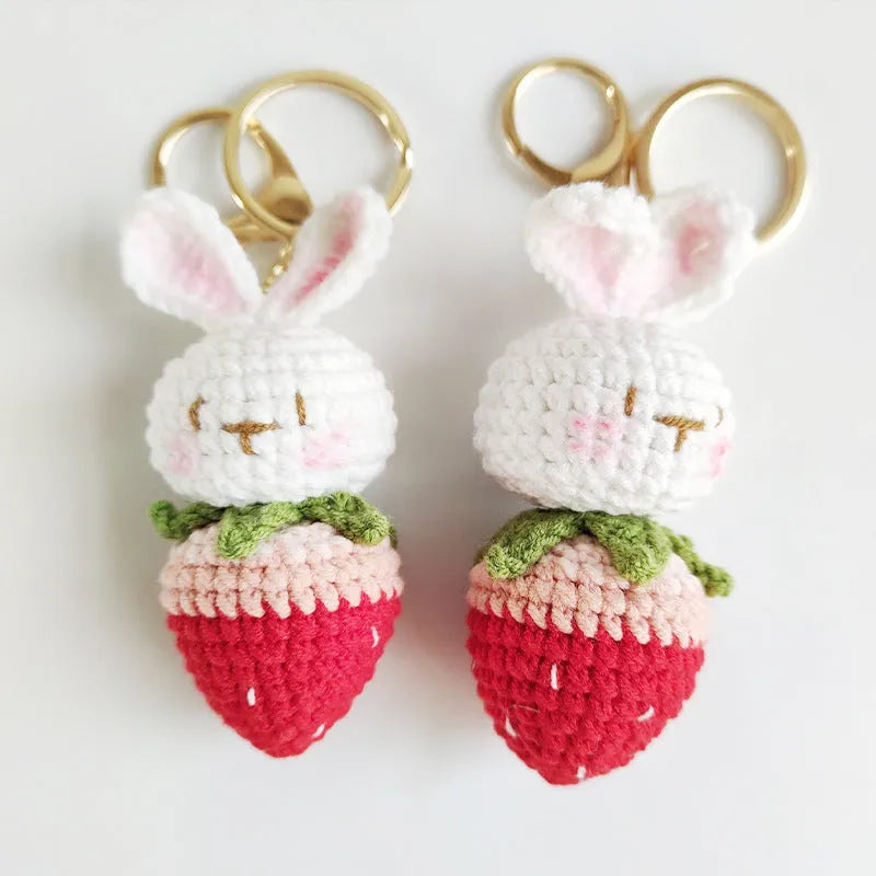 Hand-woven rabbit pendant with strawberry pattern made from four-strand wire with key attachment