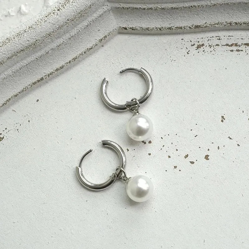 Geometric alloy pearl earrings with titanium steel posts and round pearl drops