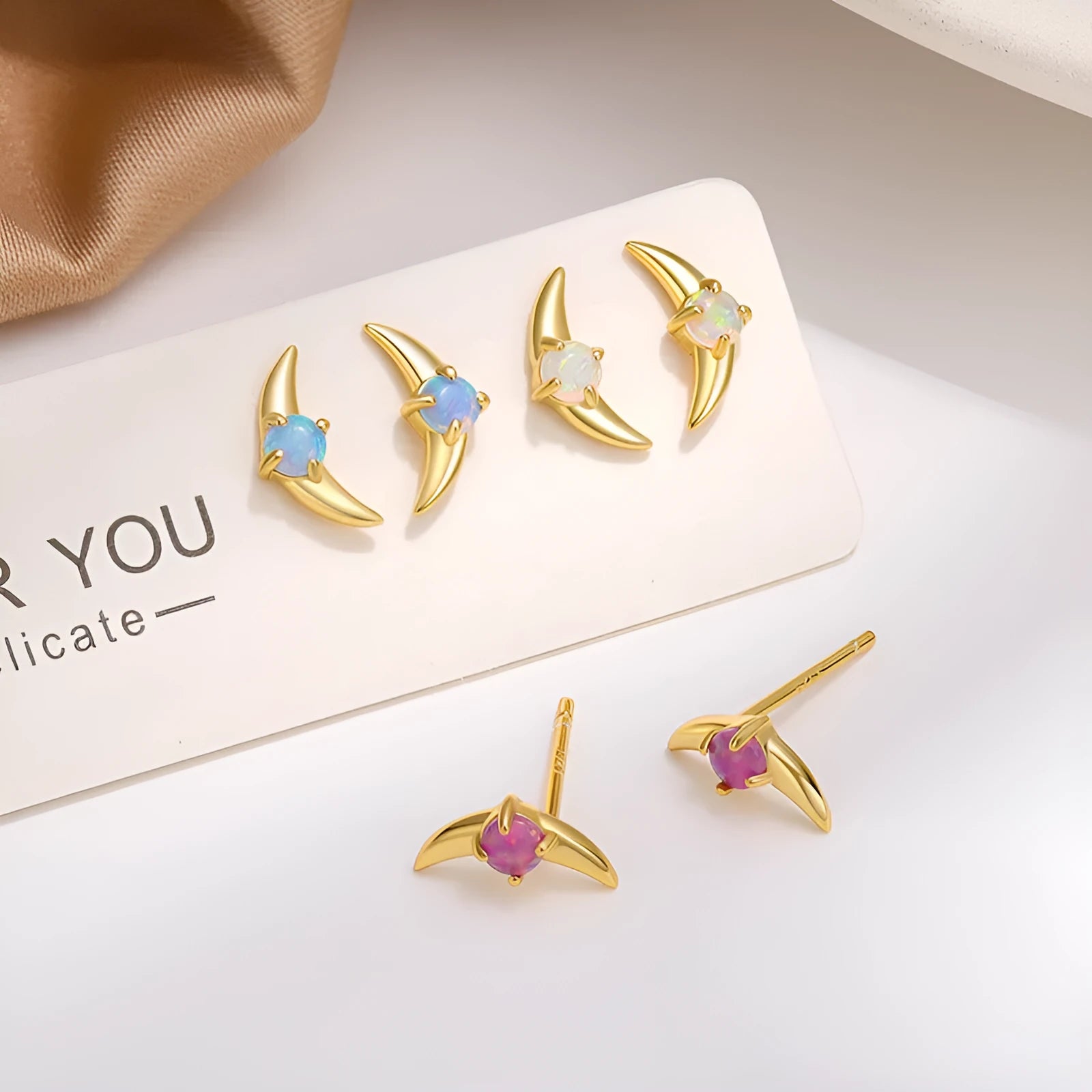 Women's geometric 925 silver earrings with cubic zirconia stones in gold or platinum finishes