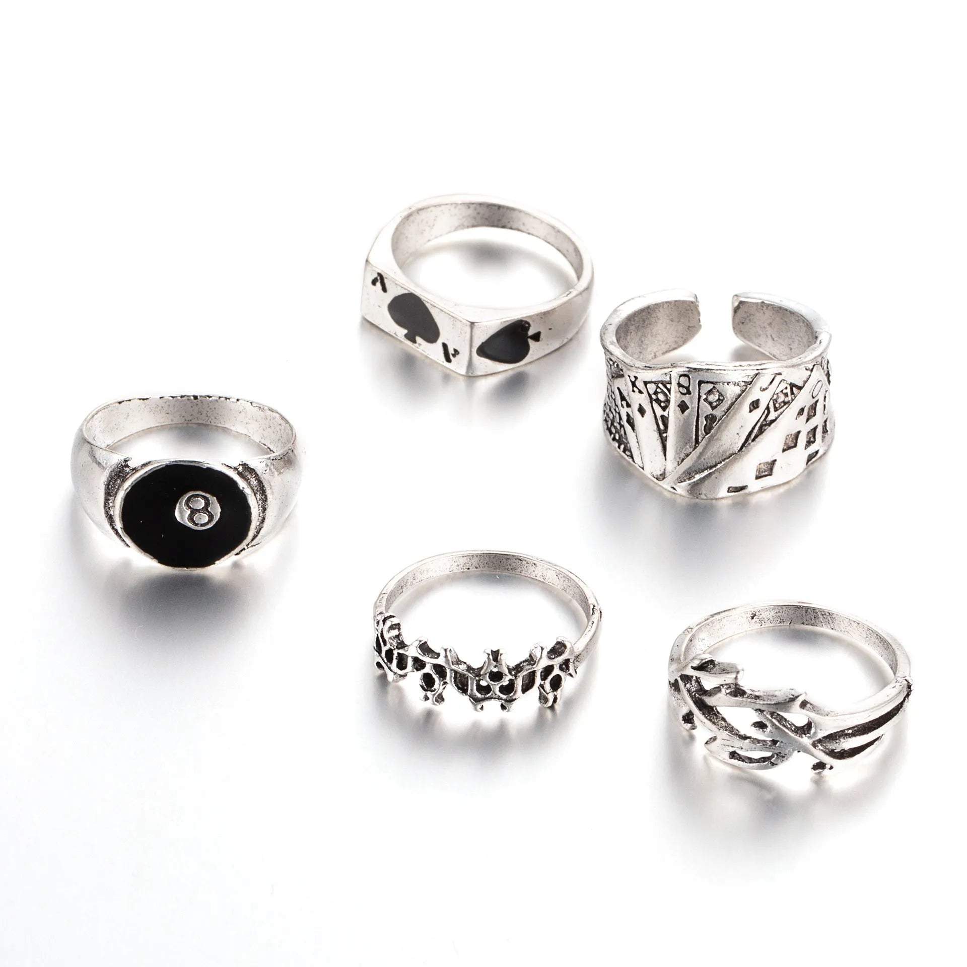 Black alloy poker ring with raised spade card design and adjustable band