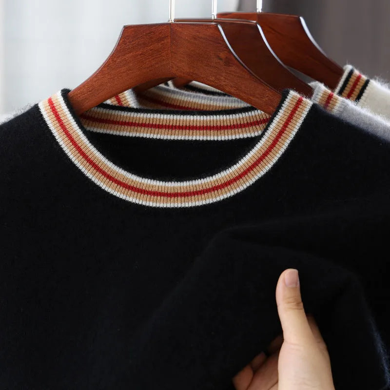 Men's grey short sleeve wool sweater with a round neck, laid flat