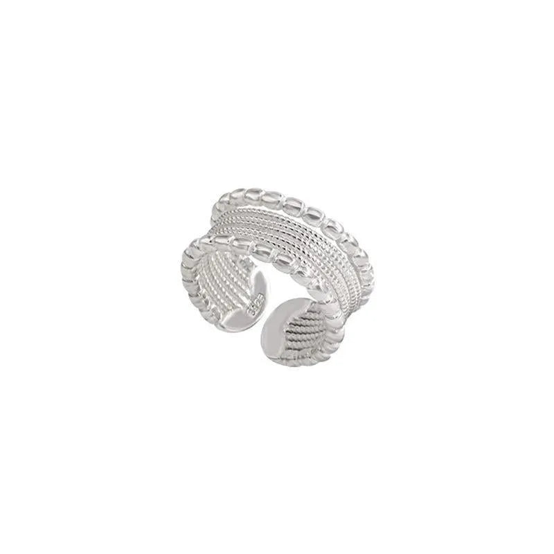 Adjustable opening geometric copper ring with woven twisted multilayer design