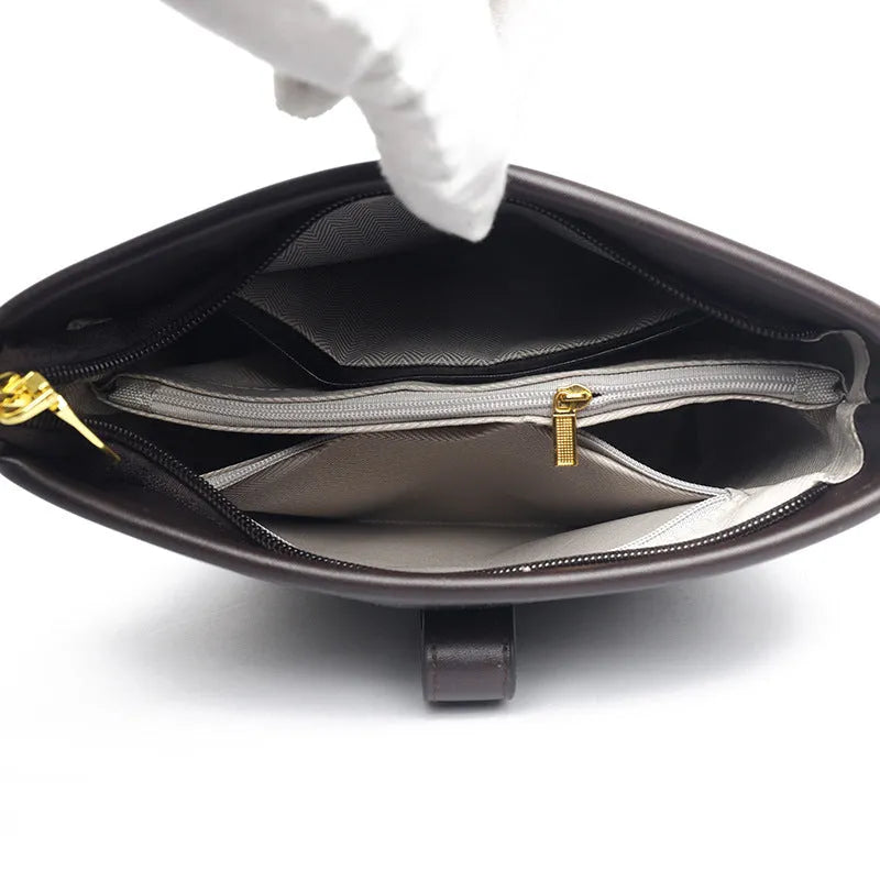 Korean style women's bucket bag in black with double shoulder straps and internal organiser compartments