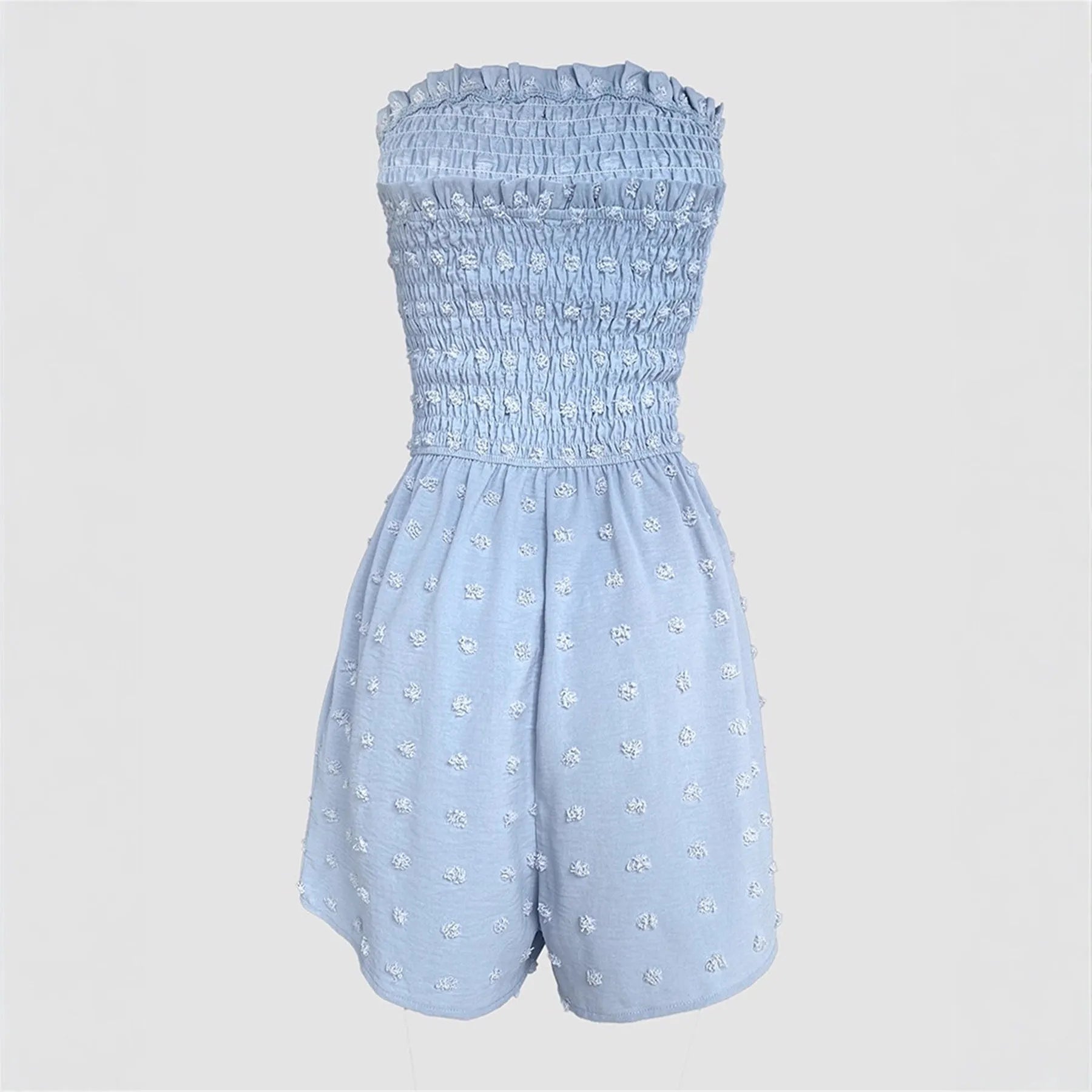 Women's sleeveless off-shoulder jumpsuit in polyester fabric showing button detailing and elastic waist