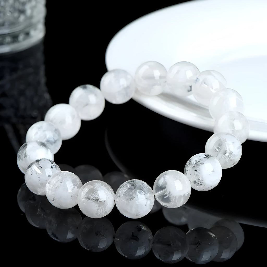 Women's crystal bracelet with matte blizzard-finished round beads and traditional Ruyi Xiangyun design.