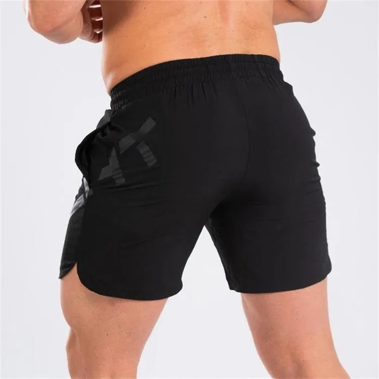 Men's elastic knee-length sports shorts in black colour for running and summer training