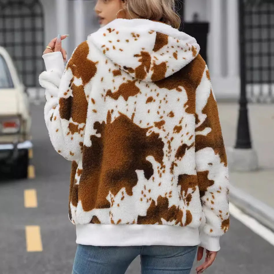 Yellow brown cow print hooded zip up cardigan jacket in plush polyester fabric.