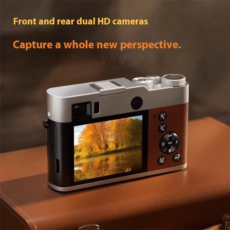 Black or brown 5K digital camera with front and rear lenses, optical viewfinder, and 2.88-inch screen