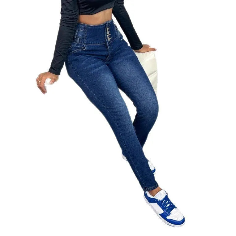 Dark blue women's straight-leg denim trousers with button details on a mannequin.