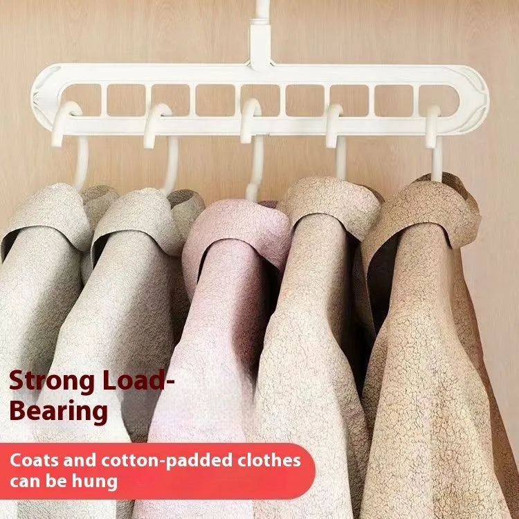 Green plastic nine-hole trousers hanger for wardrobe organisation with modern minimalist design
