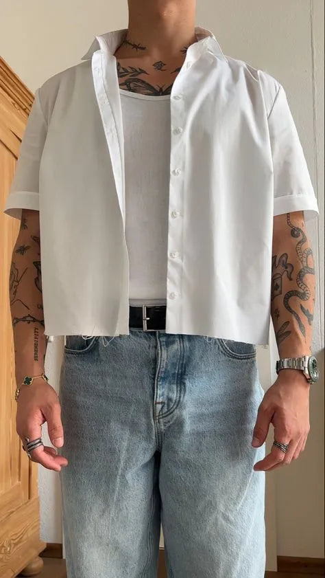 White men's cropped short sleeve polyester shirt on a hanger