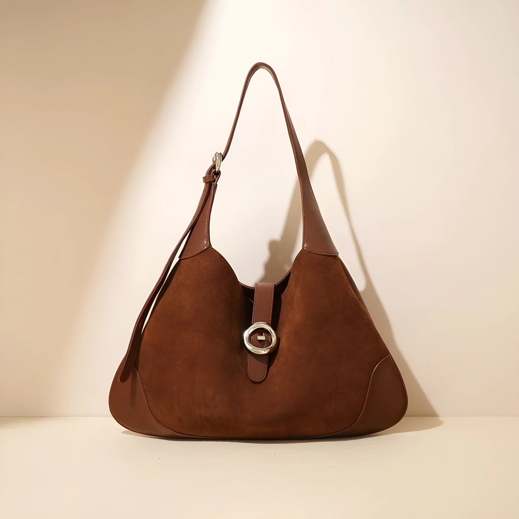 New retro commuter shoulder bag in matte cowhide with outer pocket, available in black colour
