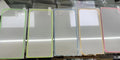 Fluorescent tempered glass iPhone screen protector in luminous colours showing full screen coverage