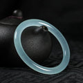 Ice-like emerald floating flower jade bracelet for women in various colours with traditional auspicious cloud patterns