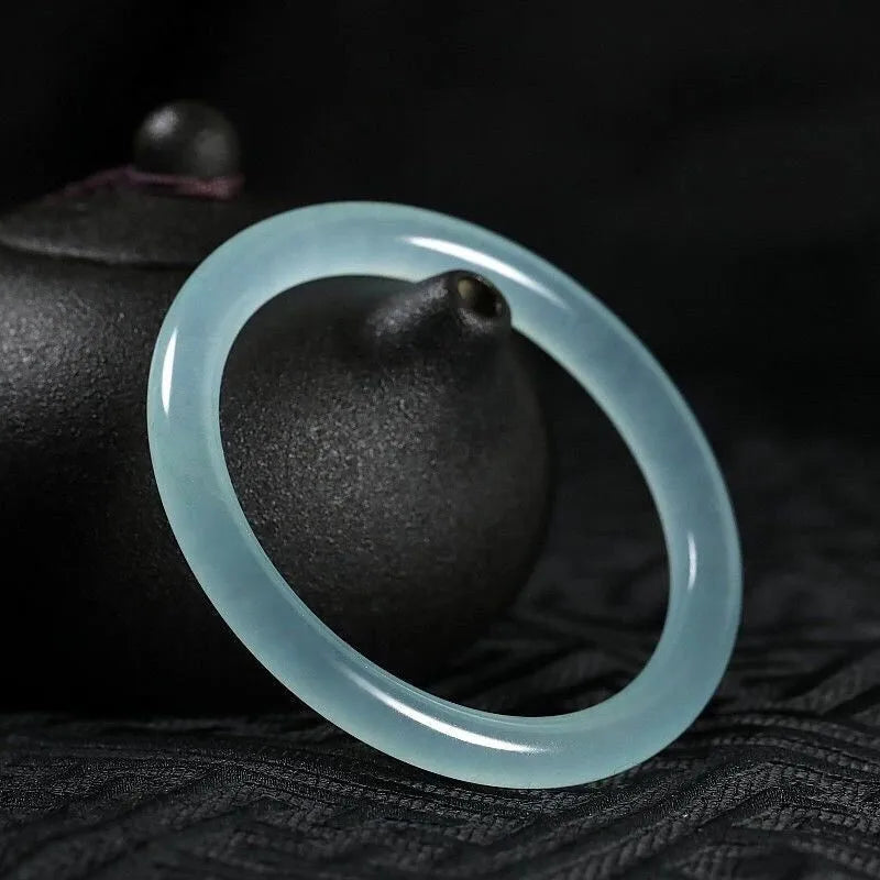 Ice-like emerald floating flower jade bracelet for women in various colours with traditional auspicious cloud patterns