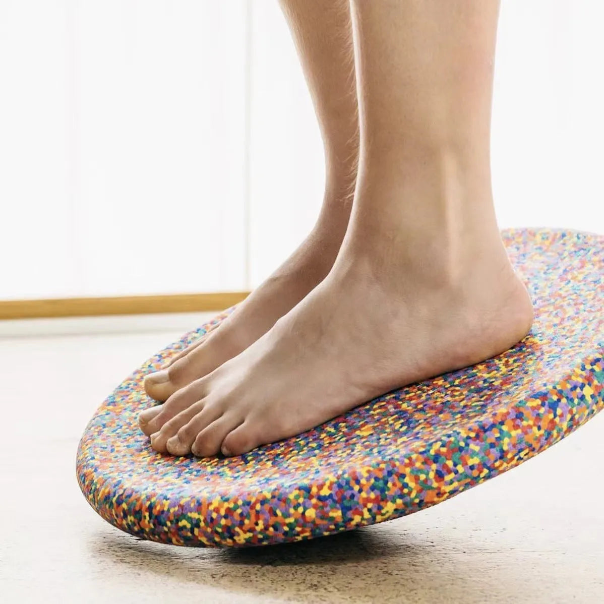 Plastic wood surf balance board for children in mixed colour or black wood effect finish.