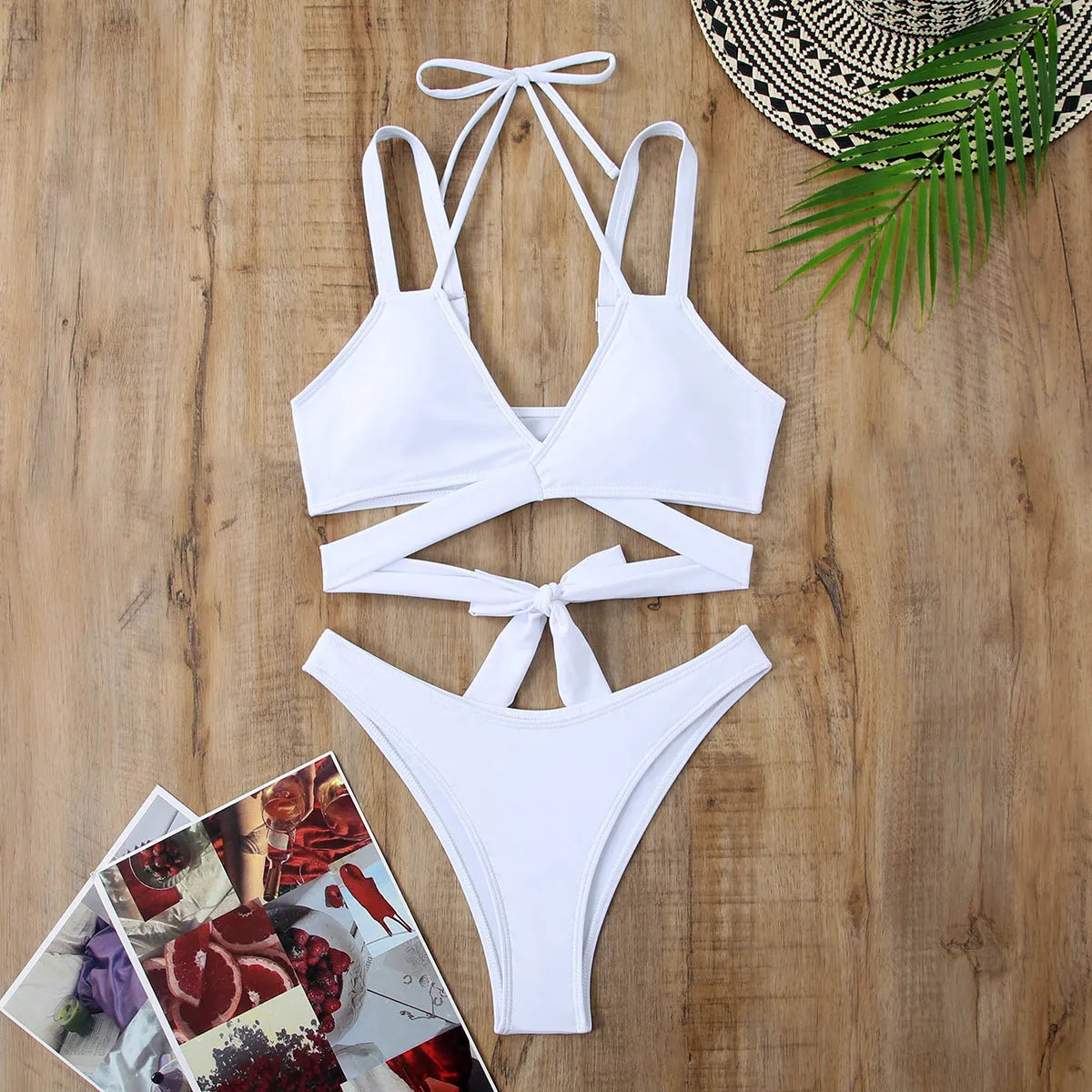 Women's solid colour strap bikini swimsuit in choice of five colours including black, red, blue, rose red, and white