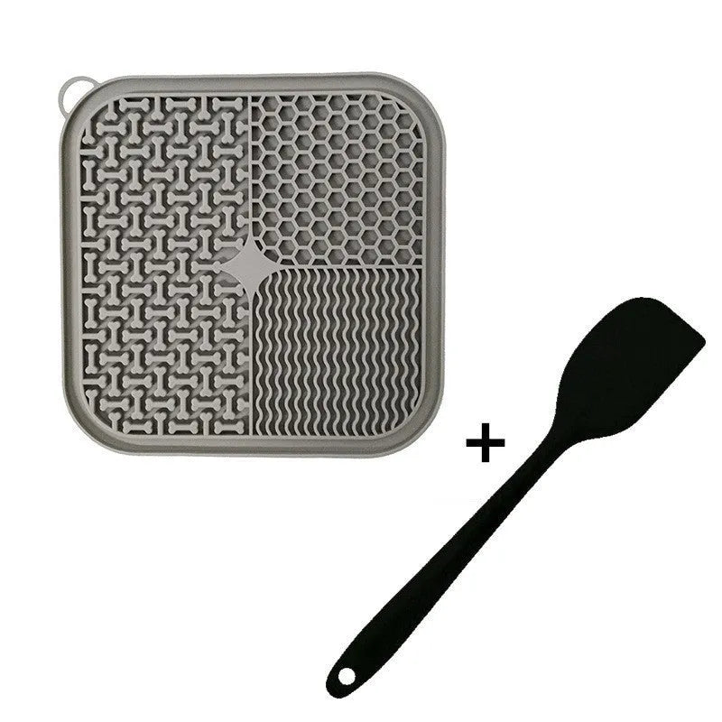 Blue silicone dog licking mat with suction cups on back, textured surface for slow feeding