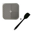 Blue silicone dog licking mat with suction cups on back, textured surface for slow feeding