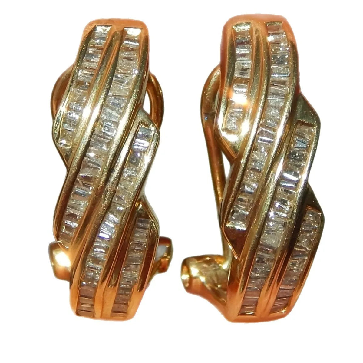 A pair of geometric copper earrings with round gold details in a retro fashion style.